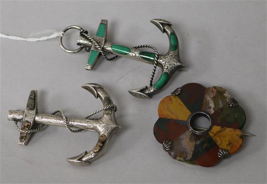 Two white metal and Scottish hardstone anchor brooches and one other Scottish hardstone brooch.